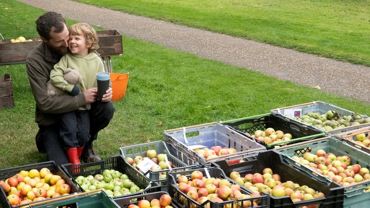 Family visitors enjoying Apple Harvest Weekend at Canons Ashby, Northamptonshire
